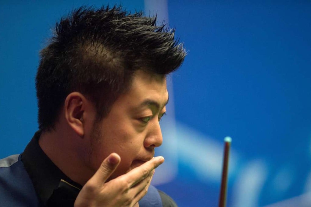 Liang Wenbo tumbles out of the World Championship at the first hurdle despite holding a commanding lead against former world number one. Photo: Xinhua
