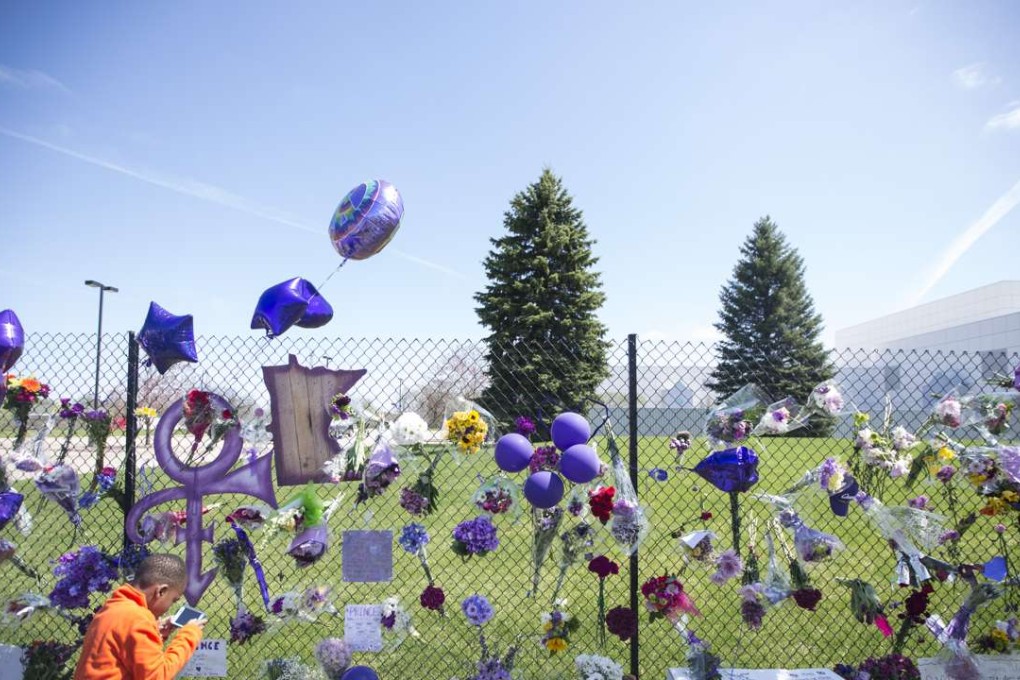 A memorial for Prince on the fence of his Paisley Park studios. Photo: AP