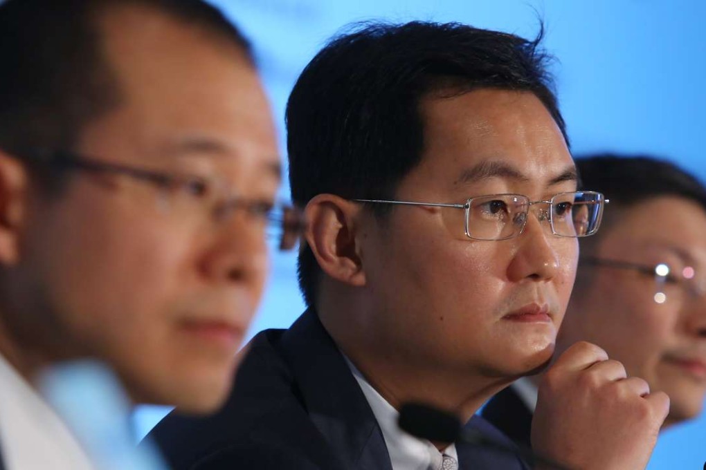 Tencent Holdings Chairman & Chief Executive officer Pony Ma Huateng (centre) attends the company’s 2014 Fourth Quarter and Annual Results Announcement Press Conference at the Four Seasons Hotel in Central on March 18, 2015. Photo: Edmond So