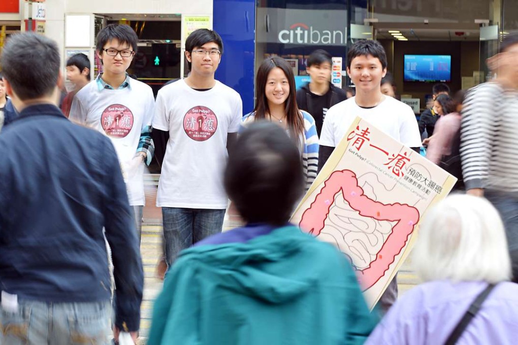 Students campaign for greater public awareness of colon cancer. The government is now doing the same. Photo: Thomas Yau