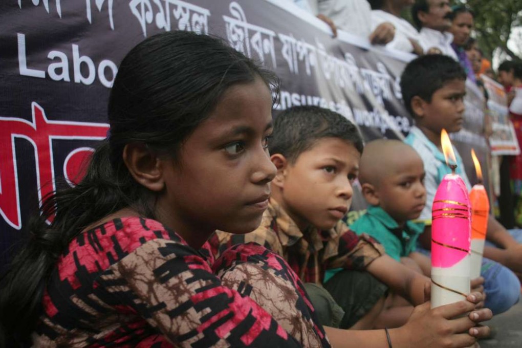 Bangladeshi activists and relatives of victims in the collapse of the Rana Plaza building attend a protest on the third anniversary of the disaster. Photo: Xinhua
