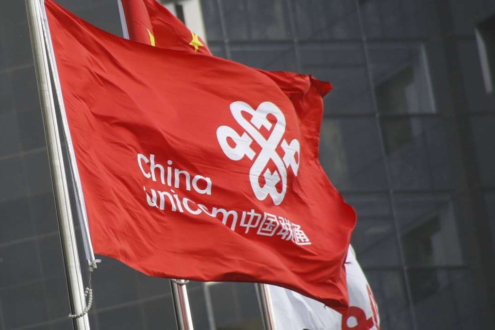 China Unicom's company flag flutters at its headquarter office in Beijing last week. Photo: Reuters
