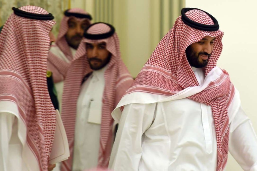 Saudi Defense Minister and Deputy Crown Prince Mohammed bin Salman (right) arrives for a press conference in Riyadh on Monday, unveiling a vast plan to restructure the kingdom's oil-dependent economy. Photo: AFP