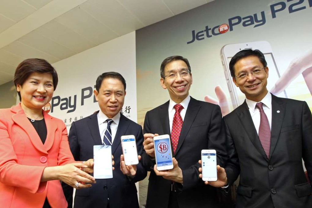 From left to right, Helen Kan, Executive Director & Alternate Chief Executive Officer of China CITIC Bank International, Angus Choi, Chief Executive Officer of Joint Electronic Teller Services Limited, David Kwok, Managing Director & Chief Executive of Shanghai Commercial Bank, and Derek Chung, Assistant General Manager & Head of Retail Banking of Wing Lung Bank. Photo: Bruce Yan