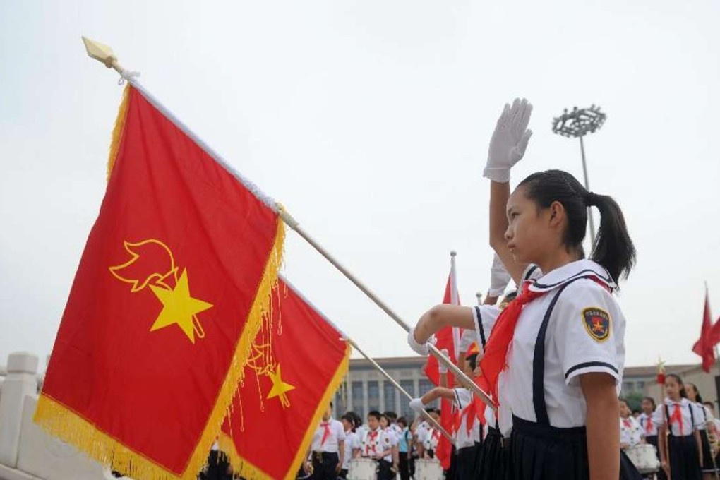 A file picture of Young Pioneers taking part in a ceremony in Beijing. The organisation comes under the control of the Communist Youth League, which has produced many of the country’s top leaders. Photo: Xinhua