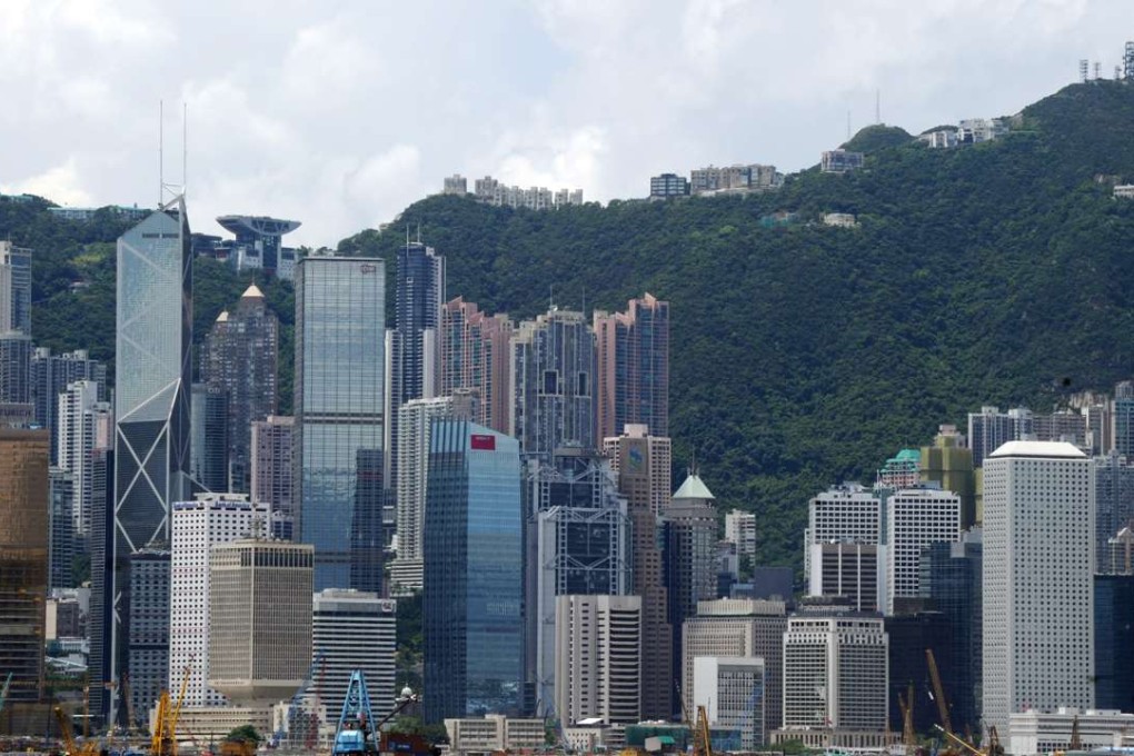 The skyline of the Central district of Hong Kong. Developers are selling off non-residential properties Photo, AFP, Mike Clarke