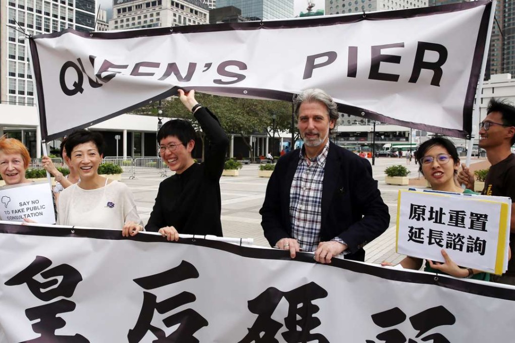 Paul Zimmerman (third from right) with other members of the Victoria Waterfront Concern Group and the Land Justice League, making their point in Central. Photo: Sam Tsang