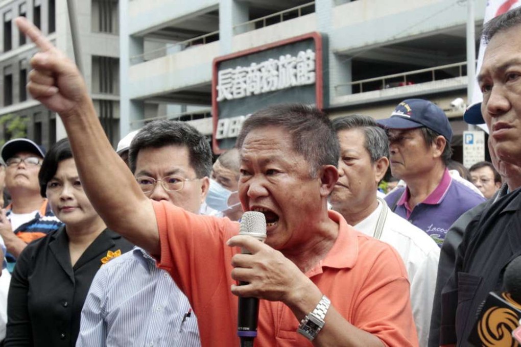 Pan Chiu-chung, centre, father of detained Taiwanese fishing boat captain Pan Chien-peng, condemns Japan during an anti-Japan protest in Taipei on Wednesday. Photo: AP