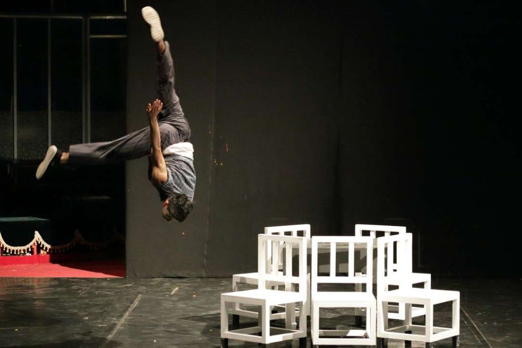 A performer dives through the air at last year’s Tini Tinou festival. Photo: Jeremie Montessuis