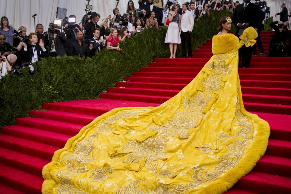 Singer Rihanna, wearing a dress by the Beijing-based designer Guo Pei, arrives at the Metropolitan Museum of Art Costume Institute Gala 2015. The designer started showing at Paris Couture week in January 2016. Photo: Reuters