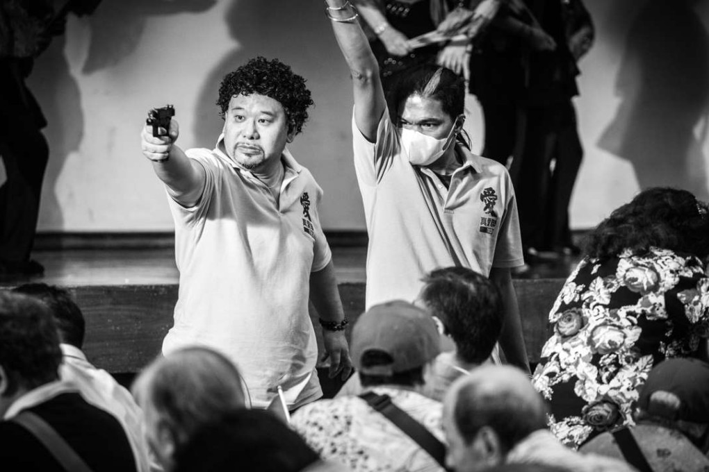 A scene from the segment Extras, one of five shorts included in the omnibus film Ten Years.