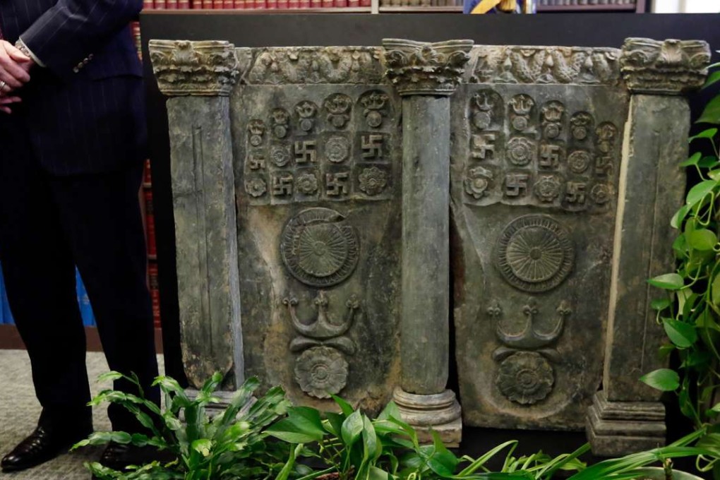 The Buddhist sculpture has been returned to Pakistan. Photo: AP
