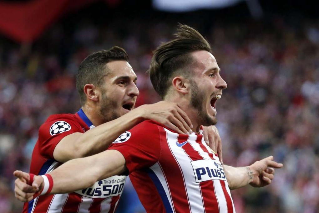 Atletico Madrid's Saul Niguez (right) celebrates with Koke after scoring against Bayern Munich. Photo: EPA