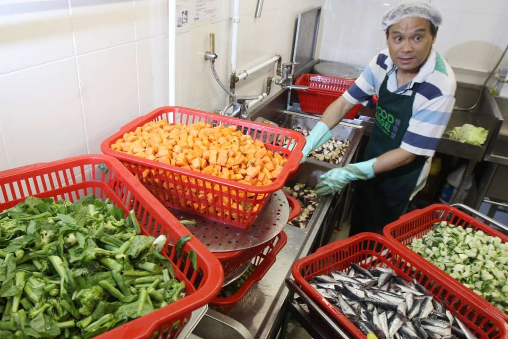 A community kitchen in Chai Wan operated by Food Angel prepares meals for the needy with donated food. Photo: David Wong