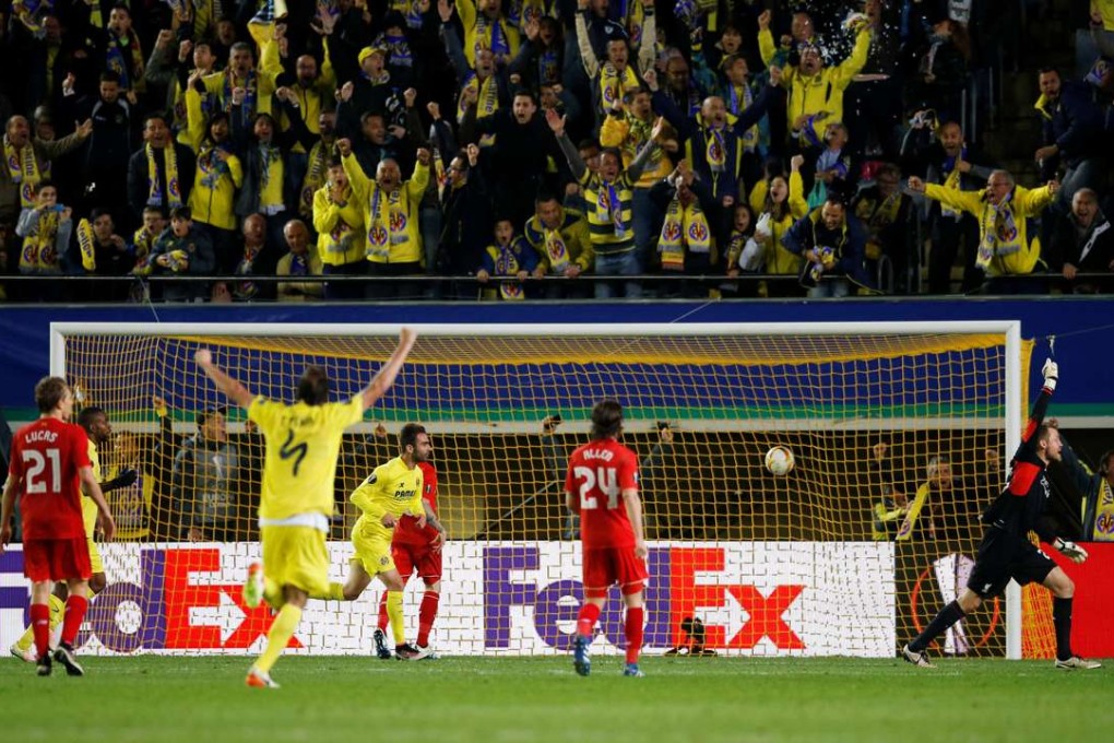 Villarreal celebrate scoring an invaluable winner at the death in the first leg against Liverpool. Photo: Reuters