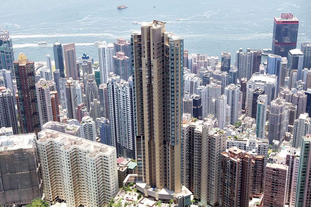 An exterior of a luxury residential block (centre) at 39 Conduit Road, Mid-levels, developed by Henderson Land. Photo: Sam Tsang