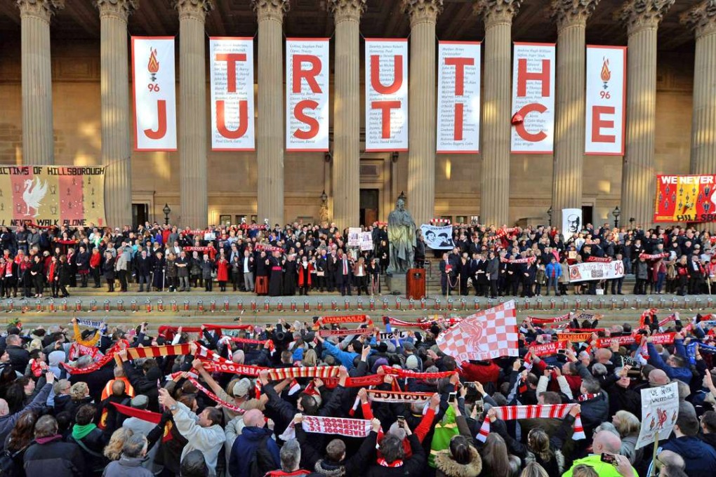 Thousands of sympathisers paid an emotional tribute to the Hillsborough disaster victims today after a landmark inquest found that 96 Liverpool football fans were unlawfully killed. Photo: AFP