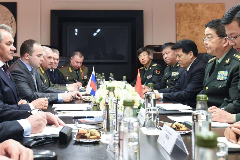 Chinese Defence Minister Chang Wanquan (second from right) meets his Russian counterpart Sergey Shoigu (second from left) in Moscow on Wednesday. Photo: Xinhua