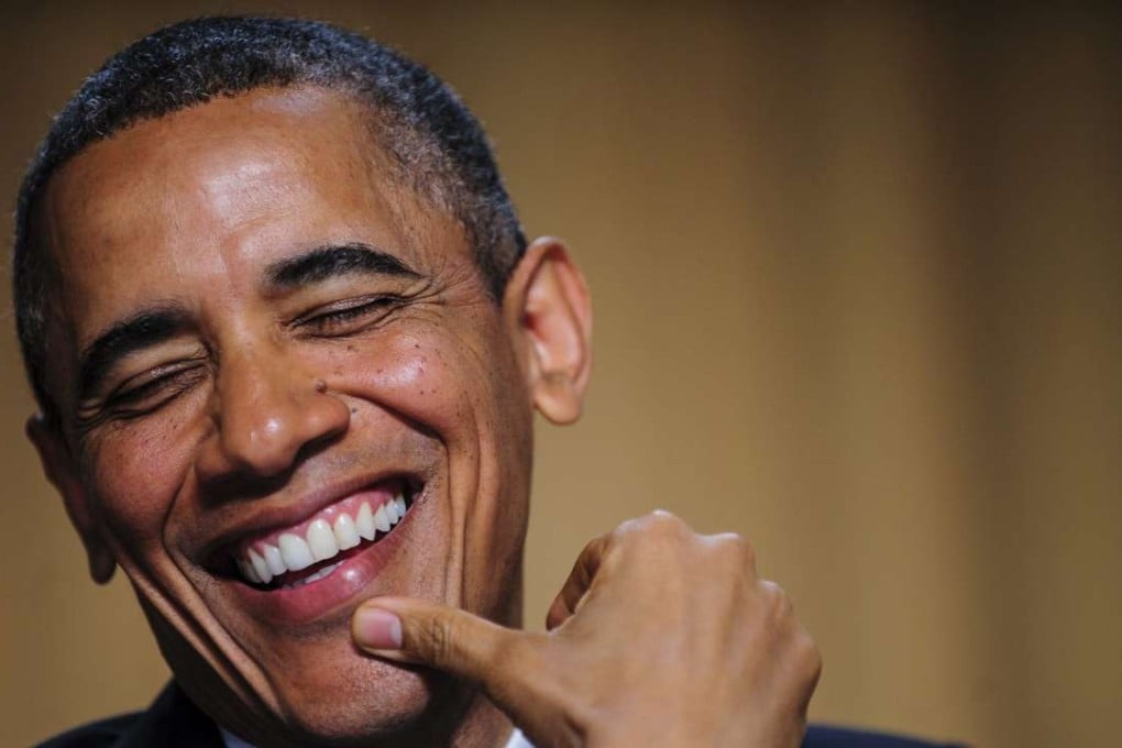 US President Barack Obama reacts to a joke told at the White House Correspondents' dinner. Photo: EPA