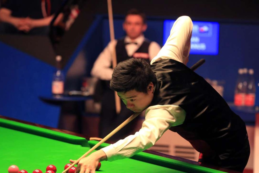 China’s Ding Junhui holds the early advantage over Scotland’s Alan McManus. Photo: AP