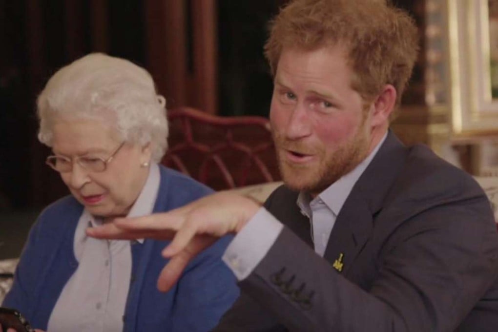 Queen Elizabeth II sitting with her grandson, Prince Harry as he says ‘Boom’ whilst receiving a video call from the President of the United States, Barack Obama and Michelle Obama. Photo; AP