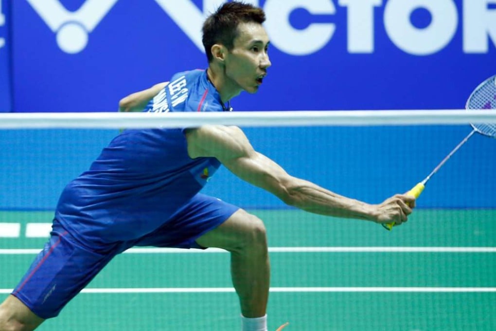 Lee Chong Wei of Malaysia hits a return during his triumph over Chen Long of China in the men's singles final at the Badminton Asia Championships in Wuhan. Photos: AFP