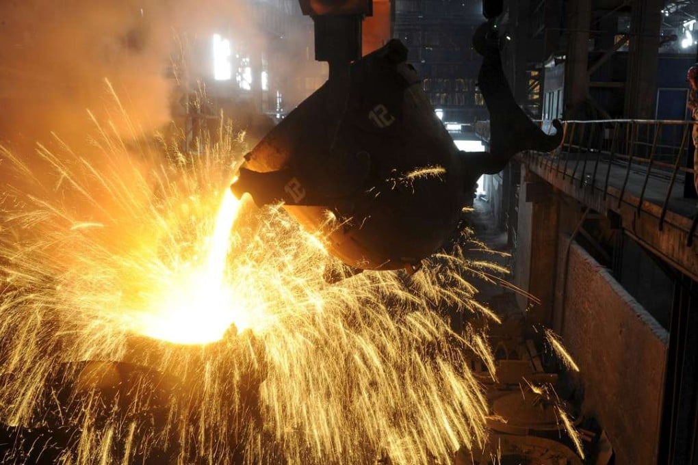 A molten iron is poured into a container at a steel plant in Hefei, Anhui province. US Steel Corporation has is asking the American trade authority to ban some steel imports from China. Photo: Reuters