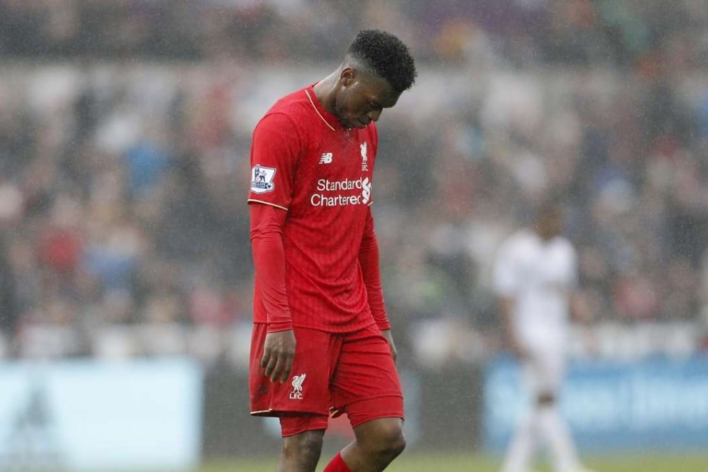 Liverpool’s Daniel Sturridge is dejected after the chastening loss to Swansea. Photo: Reuters