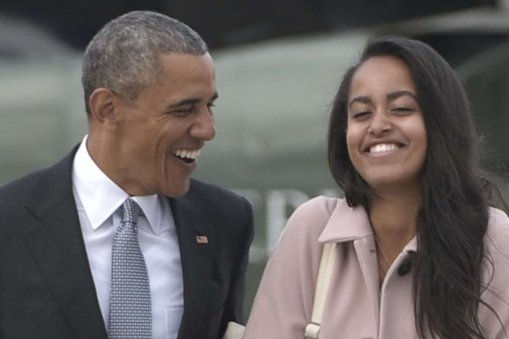 Malia Obama with her father, US President Barack Obama, last month. The White House has announced Malia will take a year out after high school before beginning her studies at Harvard University in 2017. Photo: AFP