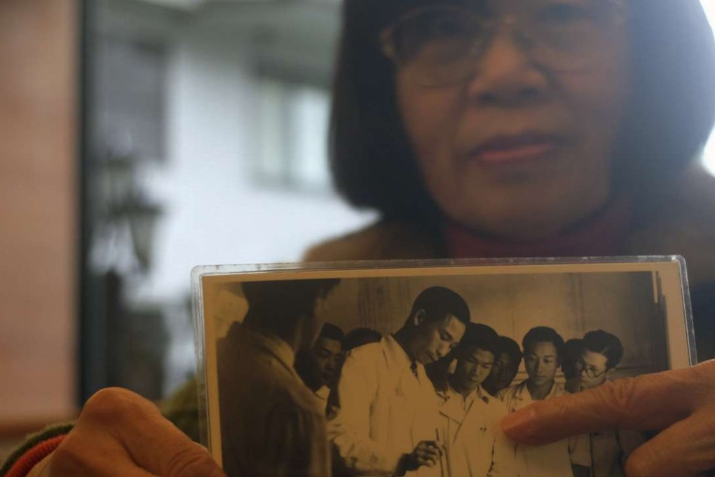 Hsu Hsu-mei points to a photo of her father, Hsu Chiang, a Taiwanese doctor who was executed during the ’White Terror’ political purge. Photo: AFP