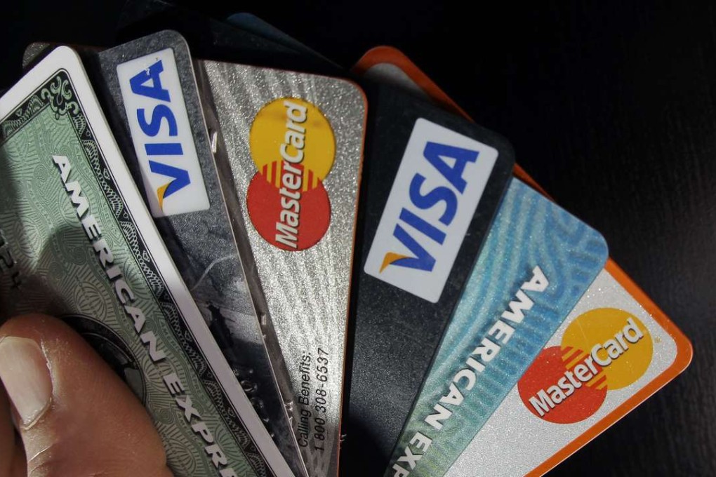 Consumer credit cards. The People’s Bank of China is set to loosen its controls over their use, potentially bringing a spike in personal debt. Photo; AP,Elise Amendola, File)
