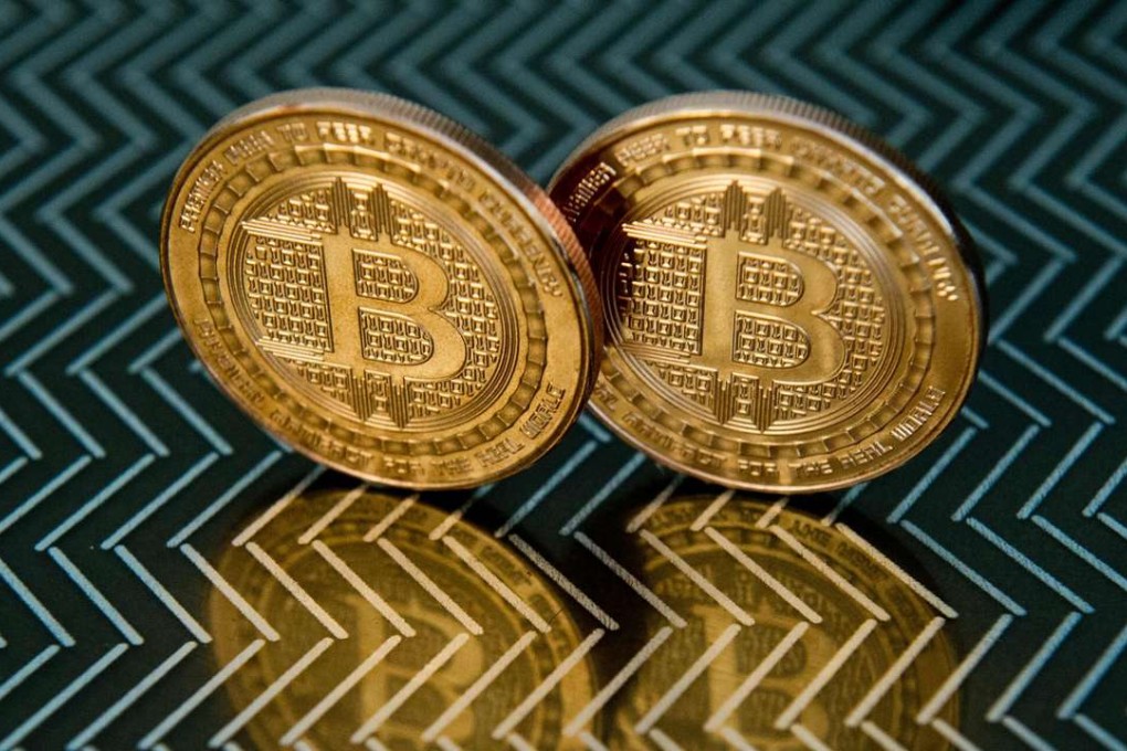 Bitcoin medals. Australian entrepreneur Craig Wright on May 2, 2016 identified himself as the creator of Bitcoin, following years of speculation about who invented the pioneering digital currency. Photo: AFP