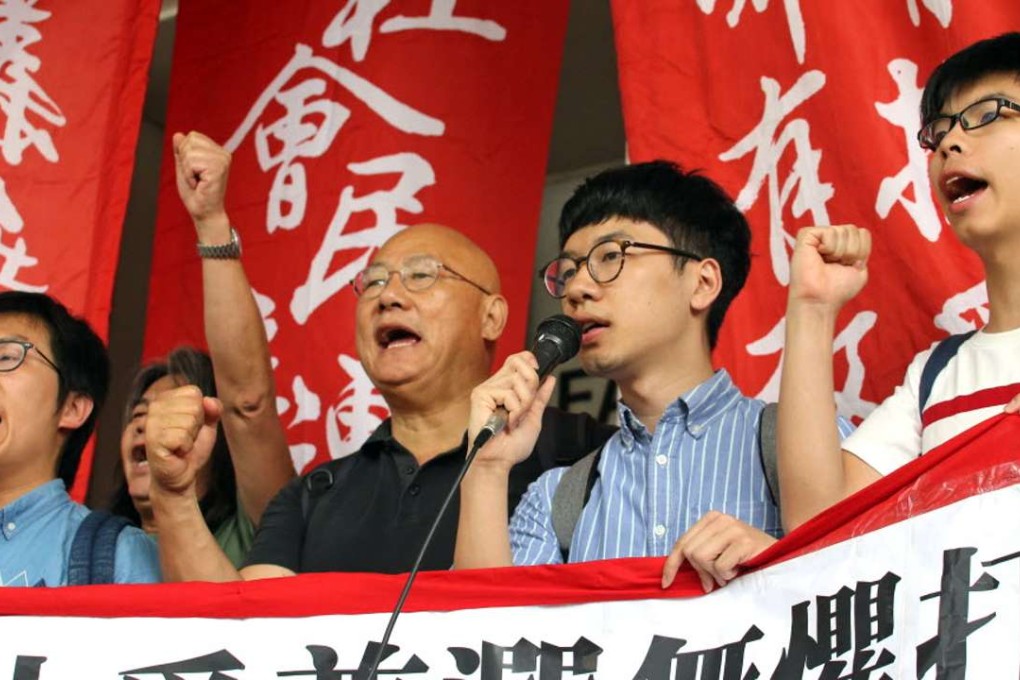 Raphael Wong (far left), Leung Kwok-hung, Albert Chan, Nathan Law and Joshua Wong protest outside court. Photo: Felix Wong