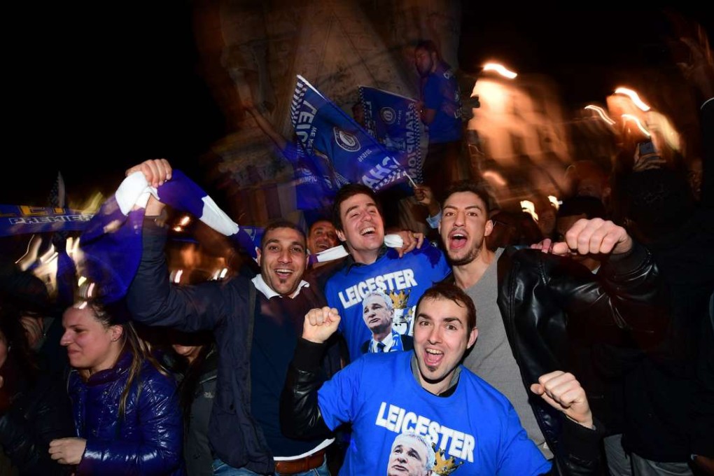 Leicester City fans celebrate their team becoming the English Premier League champions. Photo: AFP