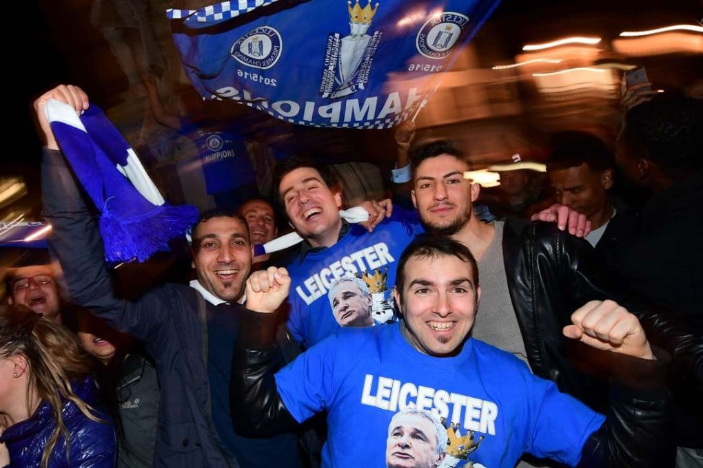 Leicester City fans celebrate their team becoming the English Premier League champions in central Leicester, eastern England. Photo: AFP