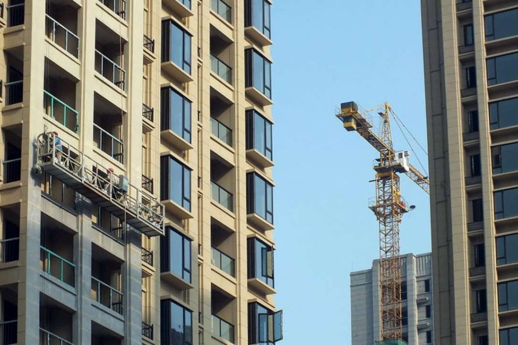 New apartment buildings are seen under construction in Yichang, Hubei province. China plans to roll out incentives for people to rent homes to reduce the country’s stock of unsold flats. Photo: Reuters