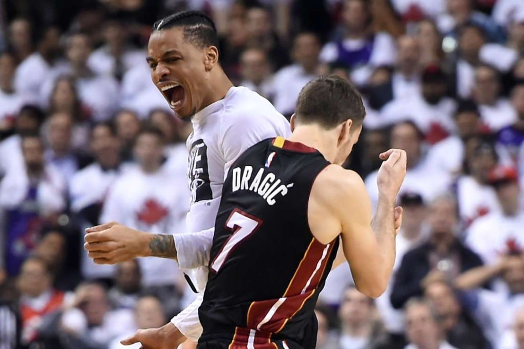 Miami Heat guard Goran Dragic celebrates with Gerald Green after a basket against Toronto Raptors. Photo: USA Today Sports