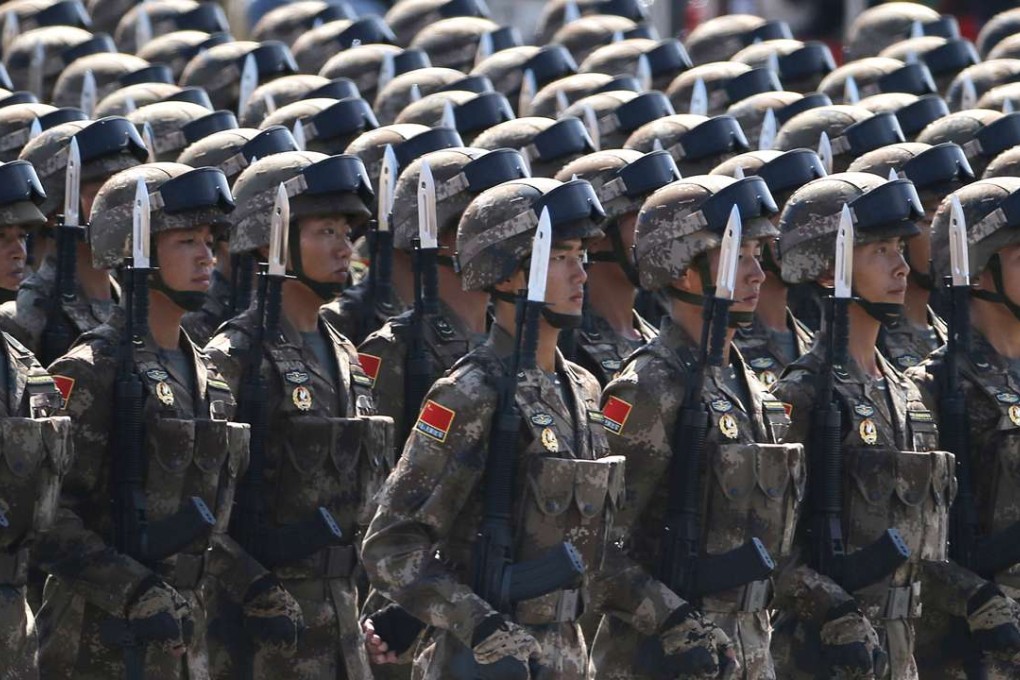 PLA troops march at the 70th anniversary of Japan's surrender in the second world war in Beijing on September 3 last year. The largest military in the world underwent a large reorganisation in 2015. Photo: AP