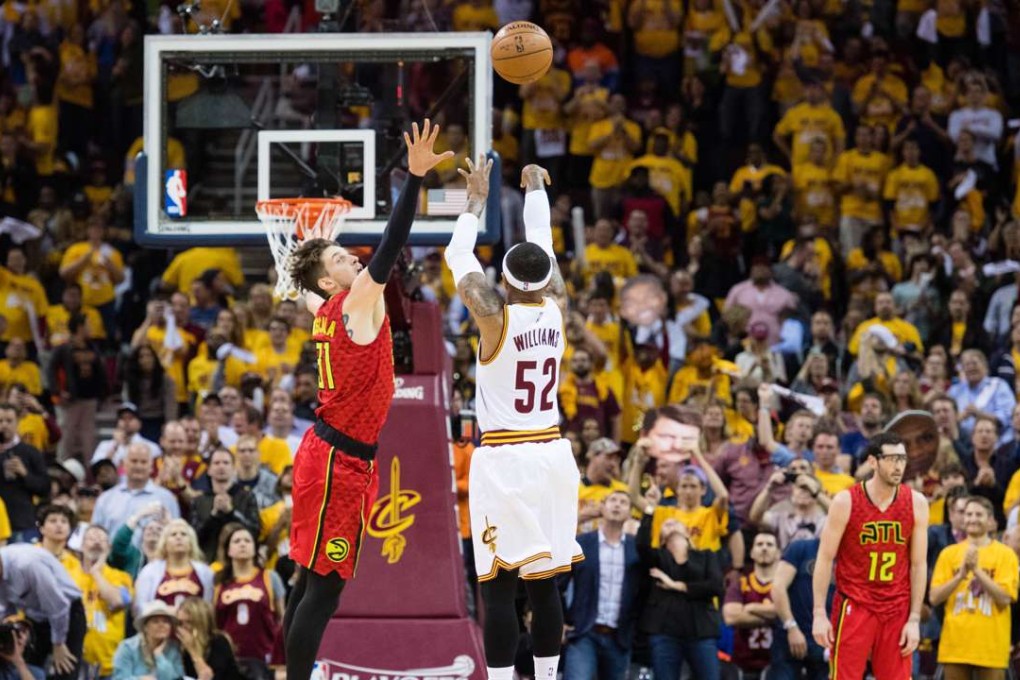 Mo Williams of the Cleveland Cavaliers sinks the record 25th three pointer during the 123-98 win over the Atlanta Hawks in game two. Photo: AFP