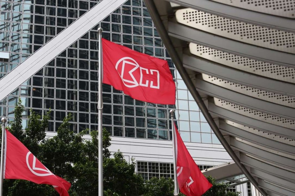 Flags of CK Hutchison Holdings LImited are seen outside Cheung Kong Centre in the Central district.
