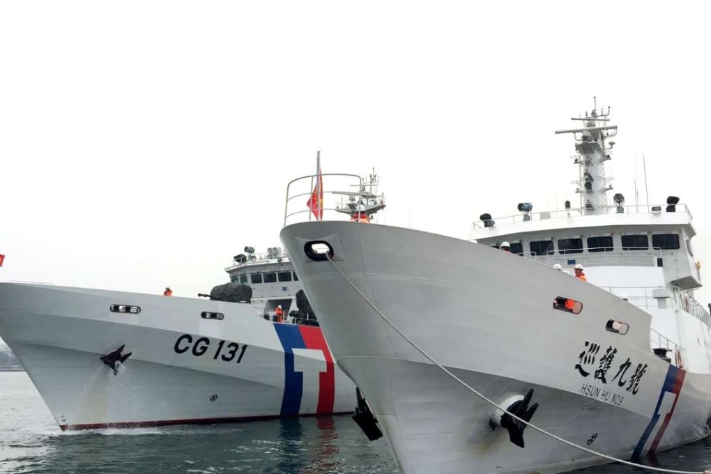 Two Taiwanese coast guard vessels pictured before patrolling in waters claimed by Japan to protect fishing vessels from the island. Photo: EPA