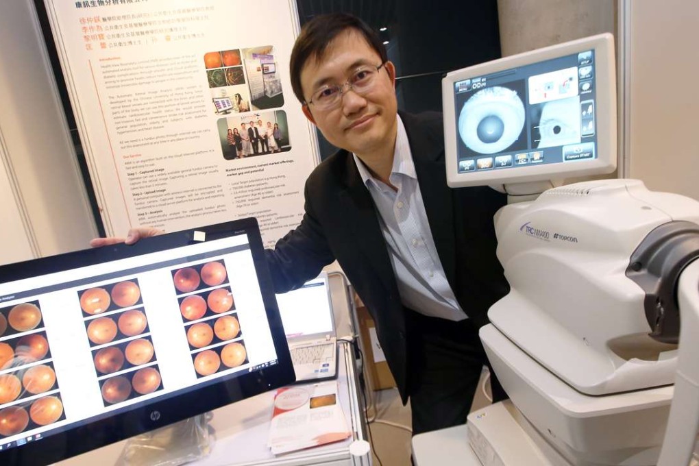 Professor Benny Zee demonstrates how the imaging system works. Photo: David Wong