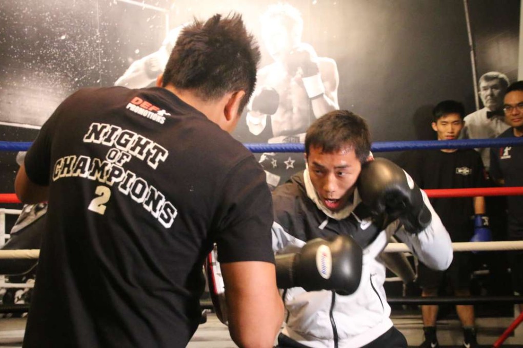 Rex Tso trains with conditioning trainer Jake Verano at DEF Boxing gym in Sheung Wan. Photos: Unus Alladin