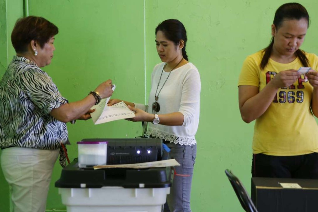 Filipinos vote at Bayanihan Centre in Kennedy Town with many hoping that an organisation representing migrant workers will claim up to three seats in the election. Photo: Sam Tsang