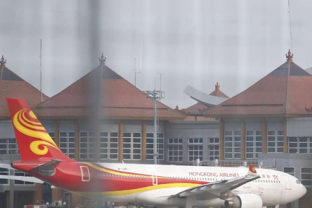 The flight, bound for Hong Kong, had to turn back to Bali after 17 passengers were injured when the plane hit severe turbulence. Photo: EPA