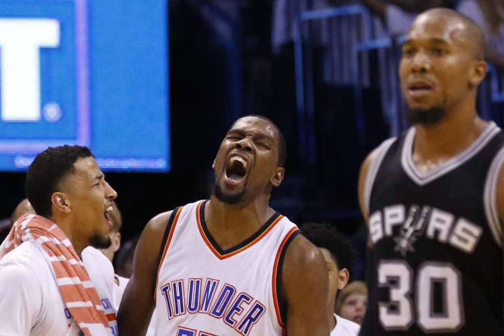 Oklahoma City Thunder forward Kevin Durant celebrates after scoring against the San Antonio Spurs. Photo: AP