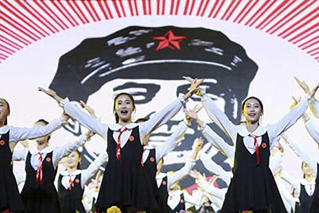 The ‘red song” concert reportedly featured songs popular in the Cultural Revolution’s heyday against the backdrop of propaganda posters from the period. Photo: SCMP Pictures