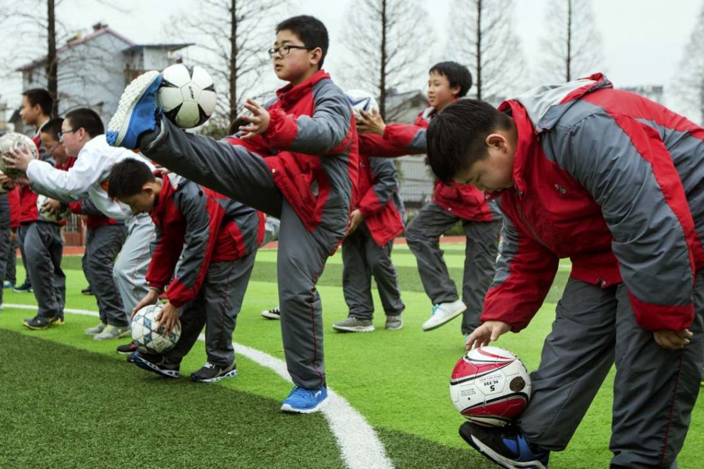Children taking part in a soccer training class at a school in Hangzhou in March. Photo: AP
