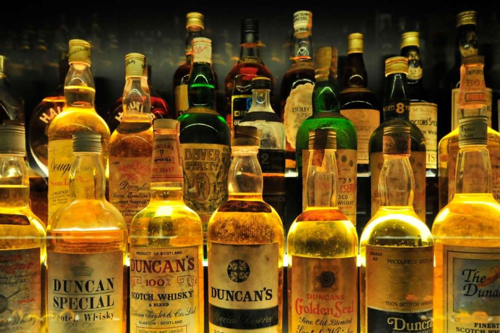 Some of the 3,384 bottles at the Scotch Whisky Experience in Edinburgh, the largest collection of whiskies in the world. Photo: Alamy