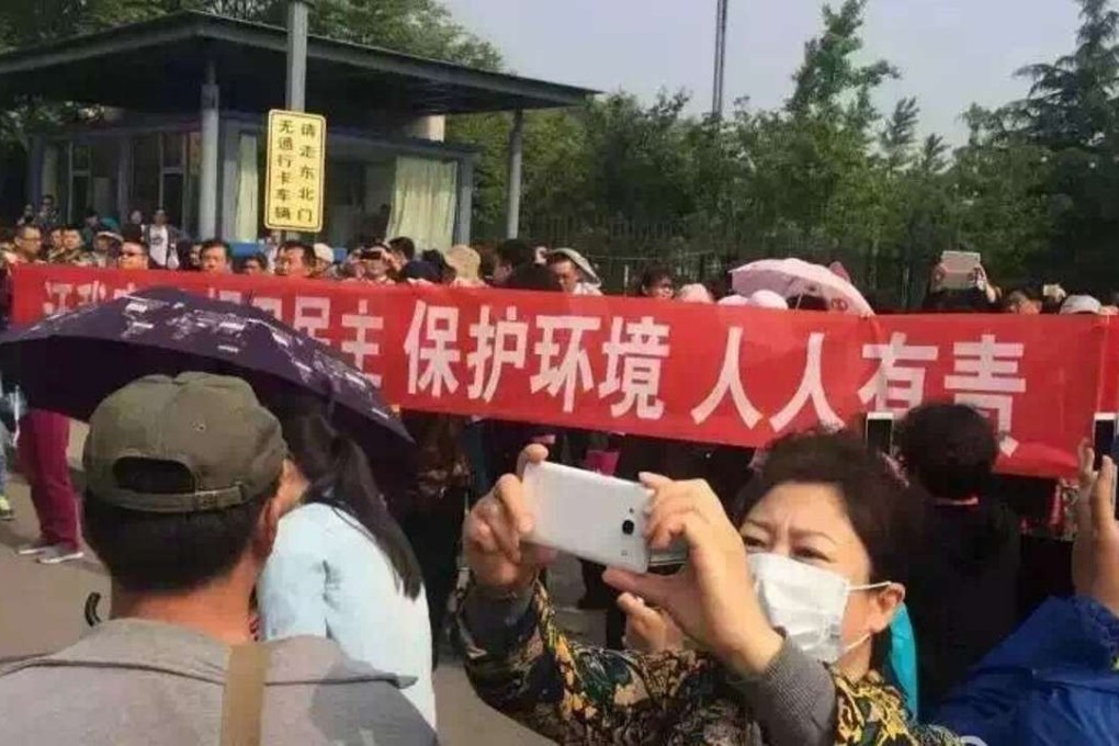 Crowds take to the streets to protest against the proposed petrochemical plant. File photo